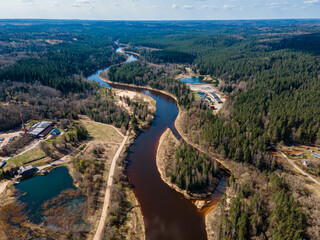 Fototapeta na wymiar Gauja national park, Latvia. Peaceful landscape with Gauja river near Cesis municipality from drone