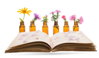 Traditional medicine with plants and book close up. BACH THERAPY. Old recipe book for herbal...