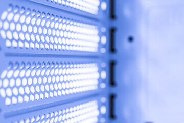 Horizontal ventilation grille. Air vents. Metal construction. Angle view. Black and white tones.