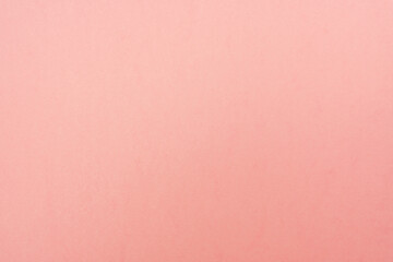 Sheet of blank paper of pastel pink color for background.