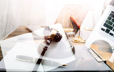 Business and lawyers discussing contract papers with brass scale on desk in office. Law, legal services, advice, justice and law concept picture with film grain effect