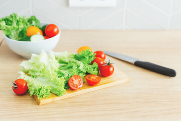 Ripe and colorful ready-to-eat vegetables. Home cooking and healthy eating concept. Natural light,...