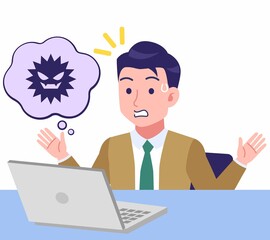 デスクワークする青年