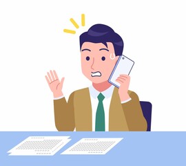 デスクワークする青年