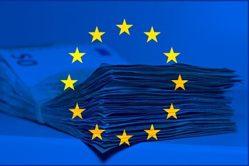 Pile of fifty euros on the table , concept of corruption and luxury