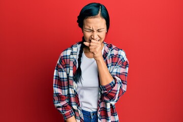 Beautiful hispanic woman wearing casual clothes feeling unwell and coughing as symptom for cold or bronchitis. health care concept.