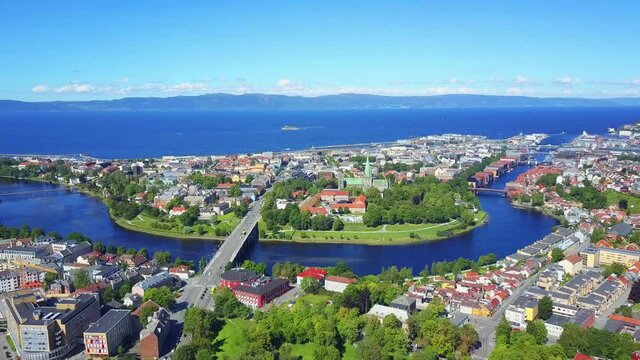 Nidelva river and Trondheim city aerial panoramic view. Trondheim is the third most populous municipality in Norway.