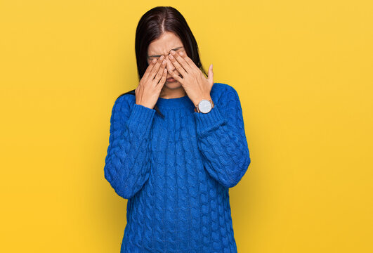Young hispanic woman wearing casual clothes rubbing eyes for fatigue and headache, sleepy and tired expression. vision problem