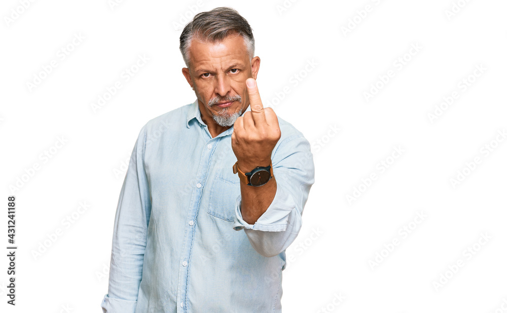 Poster Middle age grey-haired man wearing casual clothes showing middle finger, impolite and rude fuck off expression