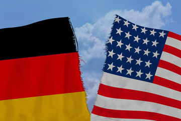 Fototapeta na wymiar two torn flags america and Germany, the concept of bad international relations, diplomatic conflict, global world trade, politics, business
