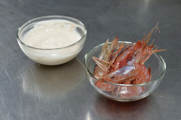 bowl with shrimp and sauce