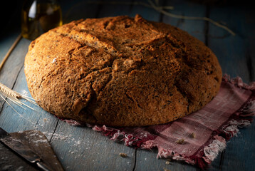 Freshly baked bread on a blue rustic table