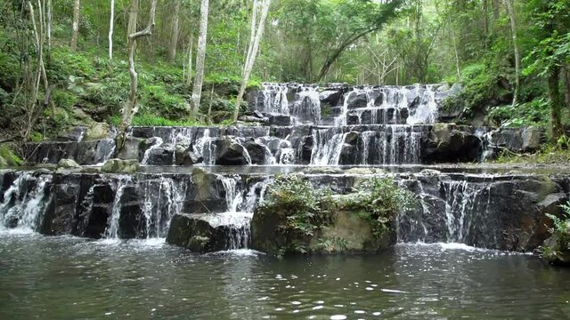 Beautiful waterfall in tropical forest at Namtok Samlan National Park, Saraburi, Thailand - Slow Motion