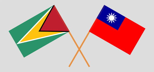Crossed flags of Guyana and Taiwan. Official colors. Correct proportion