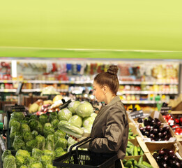 Woman buying fruits and vegetables  at the market