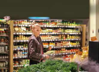 Woman buying fruits and vegetables  at the market
