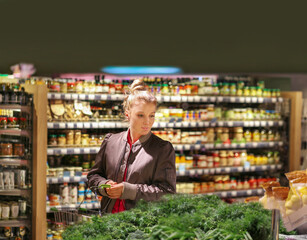 Woman buying fruits and vegetables  at the market