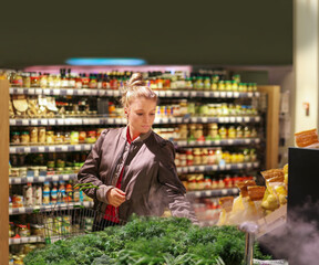 Woman buying fruits and vegetables  at the market