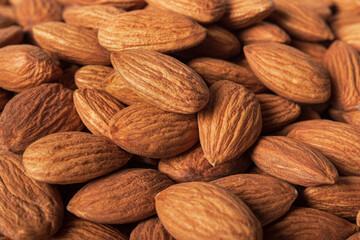 Peeled Almond Nuts, close-up. Background from almonds.