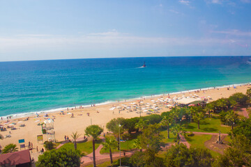 Beach in Alanya, Turkey. View and heights, top view. Blue sea in summer. Vacation in Turkey. Cleopatra beach.