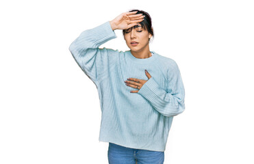 Young hispanic woman wearing casual clothes touching forehead for illness and fever, flu and cold, virus sick