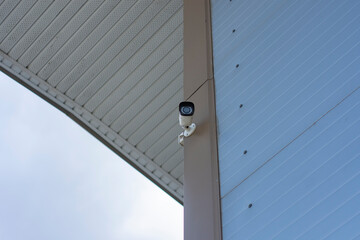 CCTV monitoring. Outdoor video surveillance camera for object protection.