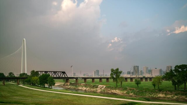 Time Lapse of Storm Clouds Over the Dallas Downtown Skyline from Large Park
