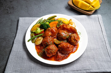 delicious meat balls with vegetables