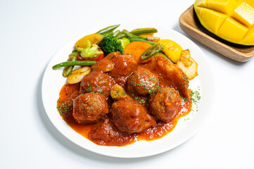 delicious meat balls with vegetables