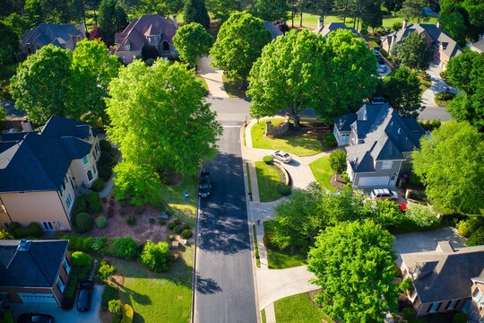 Top down view of beautiful houses in an upscale subdivision in suburbs of USA