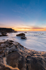 High tide water flowing on the Maroubra coastline, Australia.