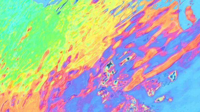 Slow motion water background. Colorful water ripples. Multicolored motion backgrounds. Surreal colors. Thermal camera effect. Abstract video can use in vertical position.
