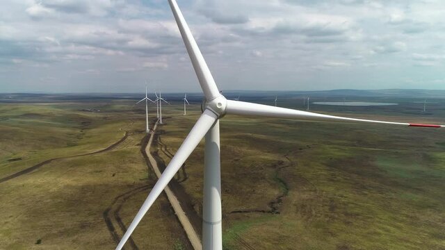 Flight over a wind farm on a cloudy day