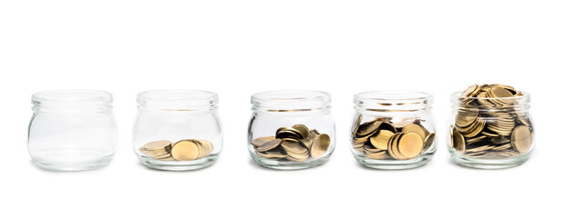 Growing step of money coins in the glass jar on isolated white background. Business and financial metaphor Concept