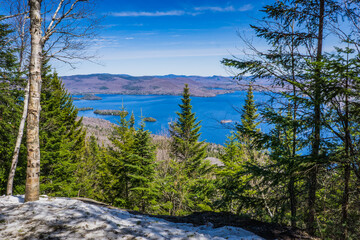 View from the Mount Ouareau on the Lanaudiere mountains and Lake Ouareau in Quebec at spring (Canada)