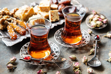 Turkish  tea served in  glass cups  with Turkish delight