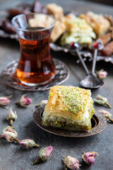 Still life with  eastern sweets and  tea in glass cup