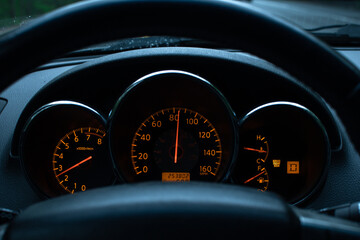 car dashboard with speedometer and dashboard