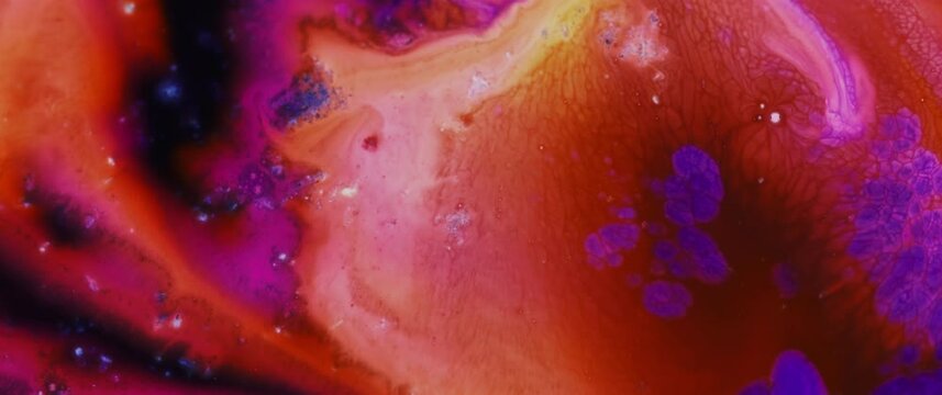 Macro Textures with Vibrant Neon Color Palette. Abstract Background Made with Oil Mixed with Gold Yellow and Purple Dye, Ink, and Paint.