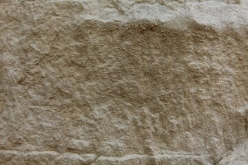 texture of a dry sandy slope of sandy color