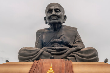 Statue of Luang Phor Thuad in Wat Huay Mongkol temple of Thap Tai, Hua Hin, Thailand - obrazy, fototapety, plakaty