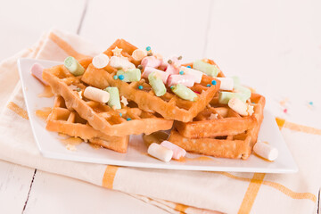 Waffles with colourful marshmallow.