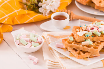 Waffles with colourful marshmallow.