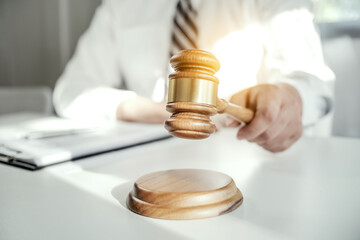 Lawyer discuss the contract and legal document agreement in office. Law and legal concept