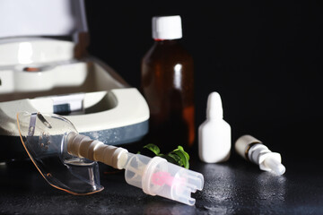 Inhalation with nebulizer at home. Asthma inhaler inhalation nebulizer steam sick cough concept flu...