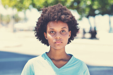 Shy and serious afro american woman in vintage retro style