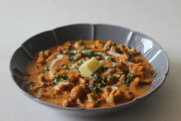 Roasted cauliflower with tomato and cashew sauce. A popular side dish from north India popularly known as gobi butter masala.