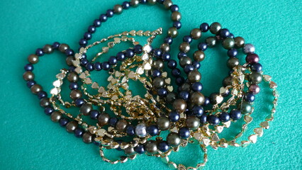jewelry beads on a green background