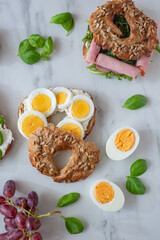 freshly baked whole grain bagels. heap of fresh baked bagels