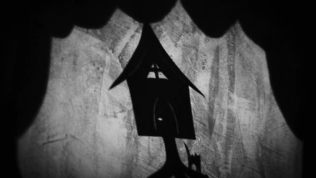 Vintage animation, shadow theatre on a wall. Pantomime, fantasy story. Halloween scene, black and white storytelling. Classic fable for children, creepy puppets.